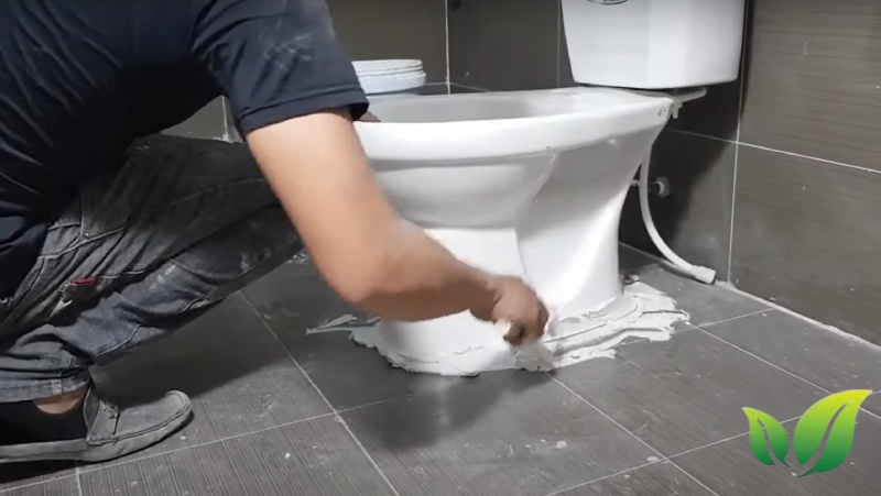 Cách lắp đặt bồn cầu inax tại nhà mà không cần thợ 15 Sử dụng vữa xi măng (xi măng trắng) hoặc silicon.